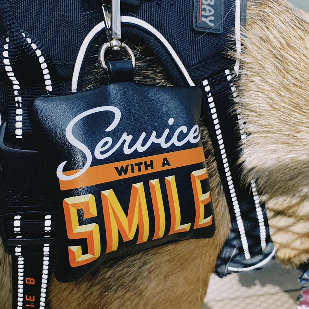 Service With A Smile Poop Bag Holder